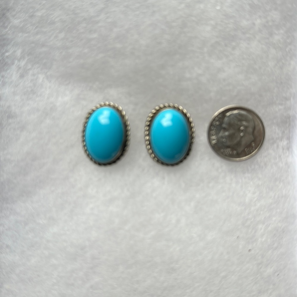 Pretty Turquoise earrings, nickel silver. Measures; 3/4 inch by 1/2 inch
